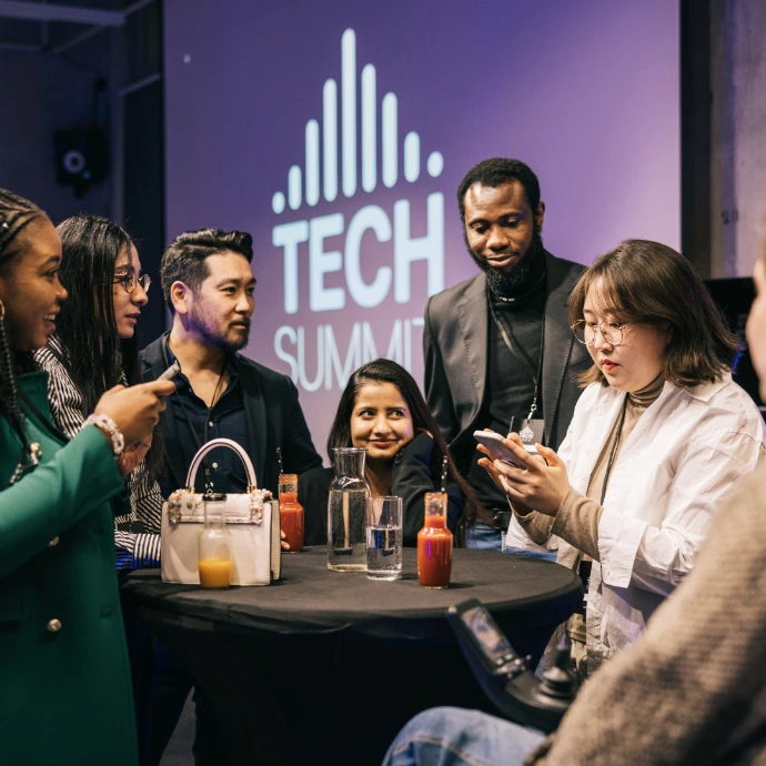 Business professionals attending technology and ERP discussion session